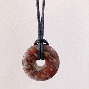 Red Jasper Stone Donut Pendant Necklace on a black 18” satin cord - NWOT